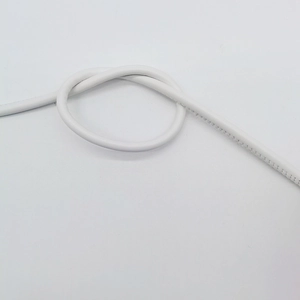 Close-up of flexible 6mm white round PVC leather cord with a single knot on white background