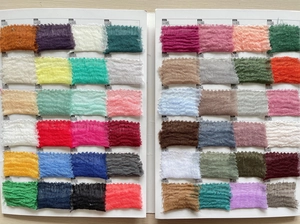 Tabella colori dettagliata con 48 tonalità di tessuto in garza di cotone e lino