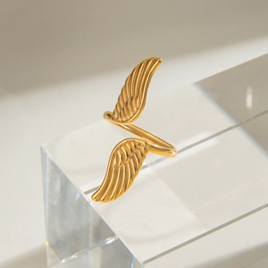 Polished gold stainless steel open ring featuring a vintage angel wing design