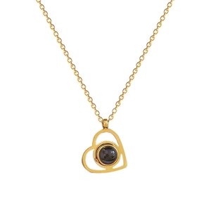 Minimalist gold heart projection necklace in titanium steel with fine chain on white background