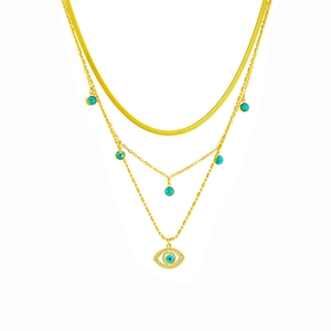 Gold multi-layer necklace with turquoise beads and evil eye pendant on white background