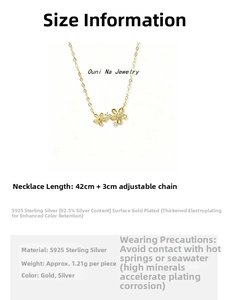 Macro view of two S925 sterling silver flower pendants with detailed gold plating