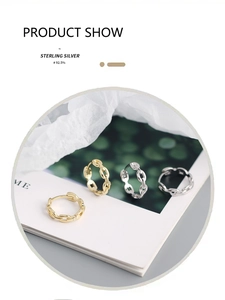 Detail of S925 sterling silver chain earrings in gold and silver finishes