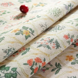 Macro view of vintage floral tablecloth fabric with ruffles and cotton linen texture