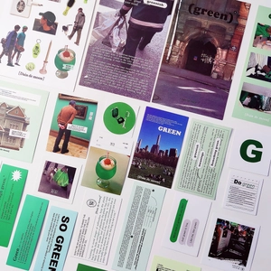 Artistic collage of green-themed stationery stickers and decorative cards on white surface