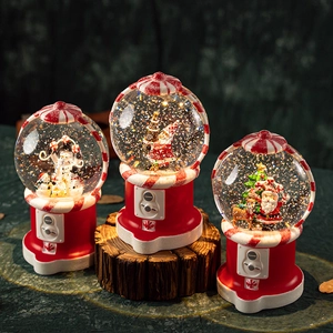 Luminous Christmas snow globe music box with Santa and snowman in a red vintage design