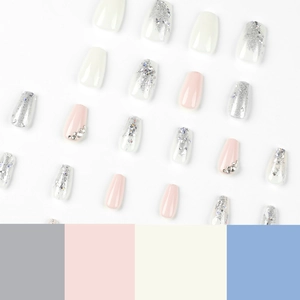 Pink and white coffin press-on nails with silver glitter and rhinestone accents