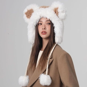 Plush bear ear bucket hat for women with white fur texture and cute pom-poms