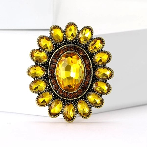Spilla vintage a girasole in bronzo con grandi strass gialli e petali decorativi fini