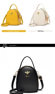 Detail of multi-layer PU leather crossbody bag featuring a golden bee metal ornament