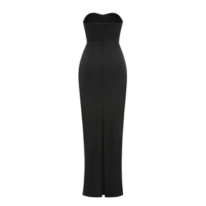 Back view of black strapless maxi dress with rear zipper and elegant slit detail
