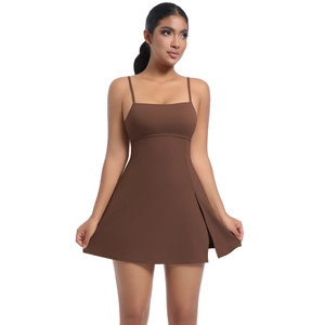 Detail view of the brown athletic dress featuring slim straps and a stylish side slit