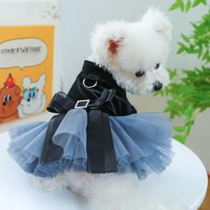 Detail of pet princess dress with blue mesh skirt, velvet bow, and metal D-ring for leash