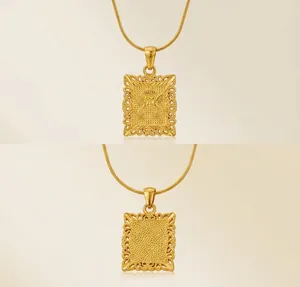 Detailed front and back view of gold stainless steel eagle pendant necklace