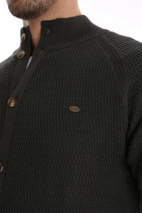 Detail of olive green waffle knit cardigan with high collar and round texture buttons