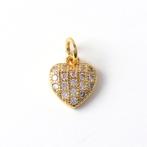 Gold plated heart pendant with micro-paved white cubic zirconia on white background
