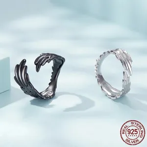 Coppia di anelli regolabili ad ala in argento sterling S925 finiture nero e argento