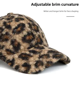 Close-up of leopard print baseball cap with widened brim and textured faux fur