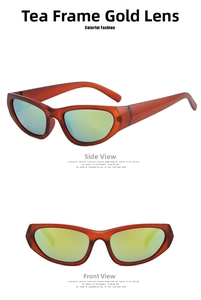 Detail view of cat eye sunglasses with brown transparent frames and yellow-green coating