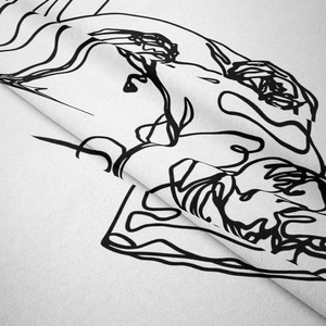 Detailed macro view of minimalist line art tapestry showing black patterns on cream fabric