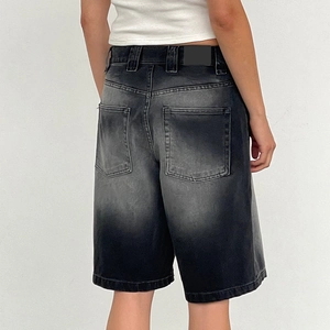 Rear view of washed black denim shorts with double back pockets and slim fit design