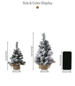 Size comparison for mini snow-covered Christmas trees in 22cm and 29cm heights