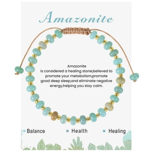 Bohemian adjustable Amazonite beaded bracelet with gold accents on a display card