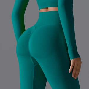 Detailed view of teal seamless high waist yoga leggings with scrunch butt lifting texture