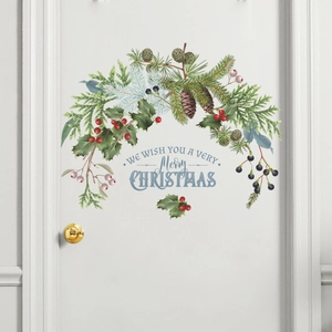 Christmas pine cone wall sticker with Merry Christmas text on a white door