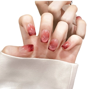 Ruby red cat eye press-on nails with gradient shimmer finish and square-round shape