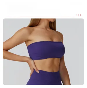 Detail of purple sports bra featuring removable pads and seamless ribbed stretch fabric