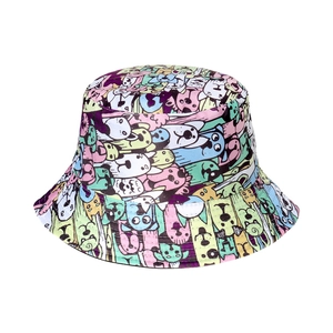 Detail of colorful hand-drawn dog cartoon pattern on streetwear cotton bucket hat