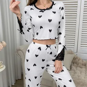 Women's heart print long sleeve pajama set with ribbed texture and lace trim details