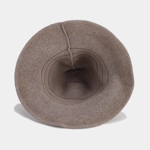 Top view of taupe knitted wizard hat with pointed top and wavy brim for Halloween