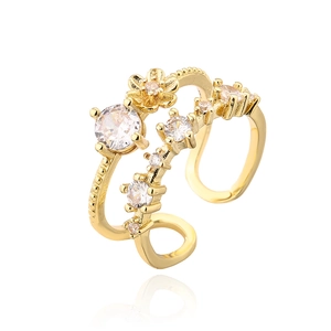 Detailed macro view of 18K gold plated flower ring with sparkling zircon inlay