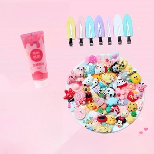 Detailed DIY hair clip kit featuring pink pearlescent cream glue and cartoon resin charms