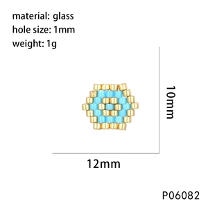Detailed view of 10mm hexagon evil eye bead handmade with gold and turquoise glass