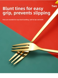 Detail of golden stainless steel dessert forks with safe blunt tines and festive design