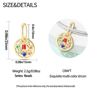 Detailed view of an artist palette bead pendant with colorful cubic zirconia and small brush