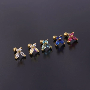 Close-up of butterfly zircon stud earrings in five colors with gold steel posts