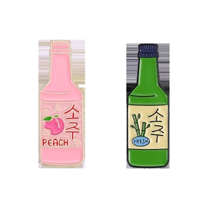 Zinc alloy enamel pins in peach and green Korean soju bottle designs with lettering