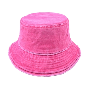 Close-up of rose pink washed denim bucket hat featuring vintage frayed edge detailing