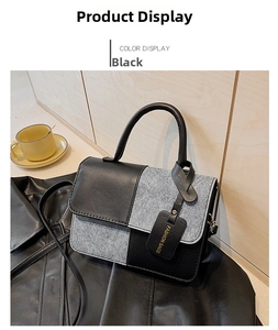 Detail of color-block flap bag with mixed black leather and grey tweed texture