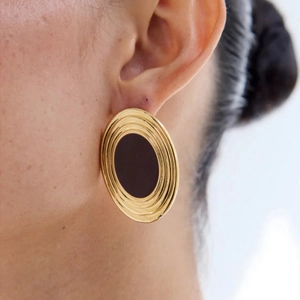 Elegant gold oval mother of pearl stud earrings with textured finish for women