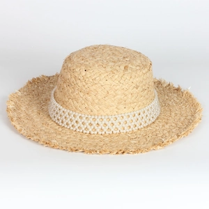 Elegant raffia straw flat top sun hat with pearl trim and frayed edges for beach vacations