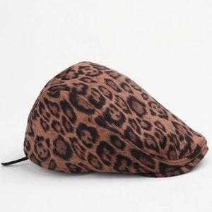 Detailed side view of vintage leopard print beret made of premium faux suede fabric