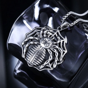 Gothic style spider and cobweb pendant necklace in vintage silver stainless steel