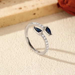 S925 sterling silver open ring with pear-cut royal blue stones and white zircon accents