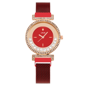 Montre femme tendance avec cristaux étincelants, cadran rouge et bracelet magnétique milanais