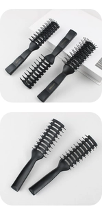 Detailed view of black anti-static vent brushes for men's styling and hair care
